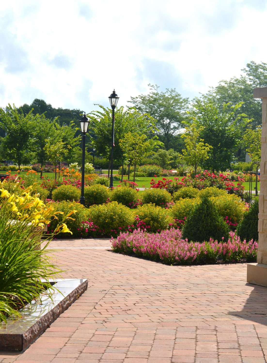 Garden design by Plant Studio Landscape filled with colorful perennials in Muncie