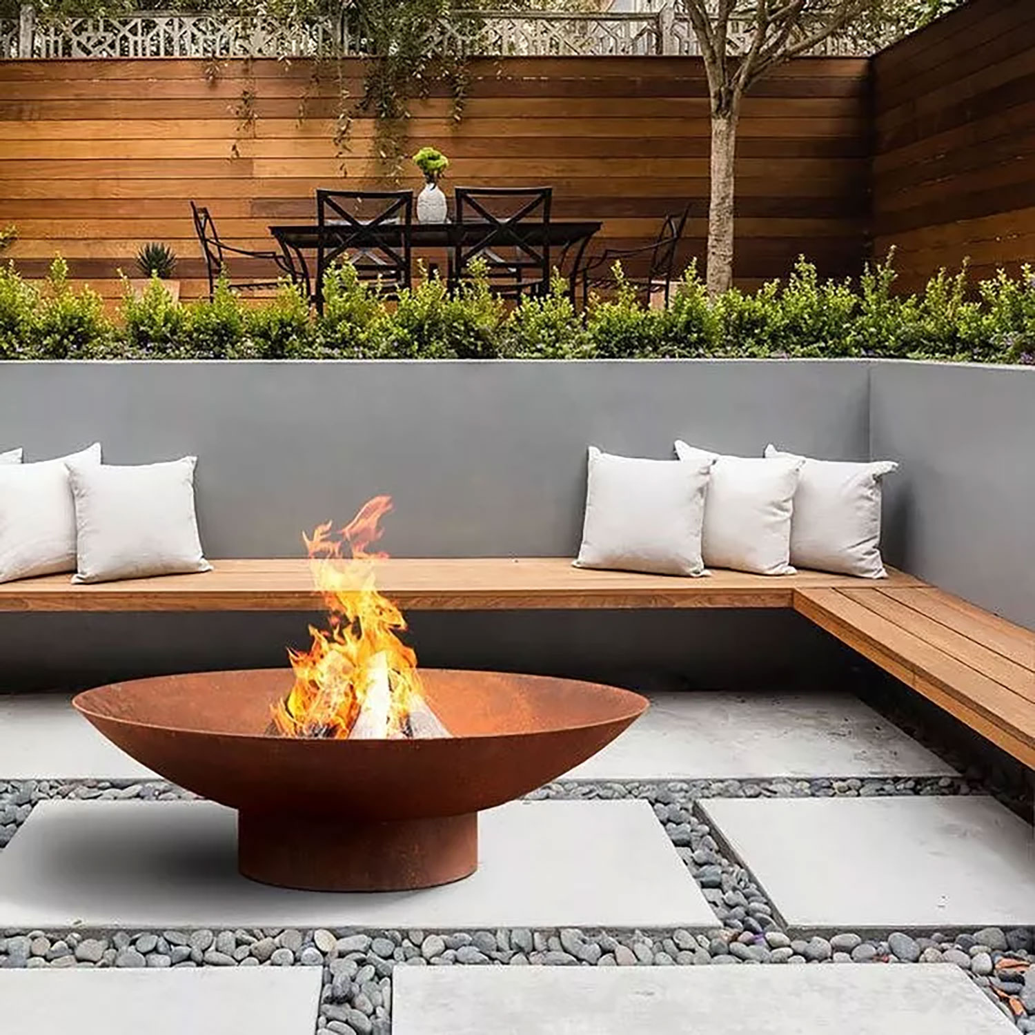 Outdoor living fire feature and hardscape in a Muncie Indiana yard built by Plant Studio Landscape