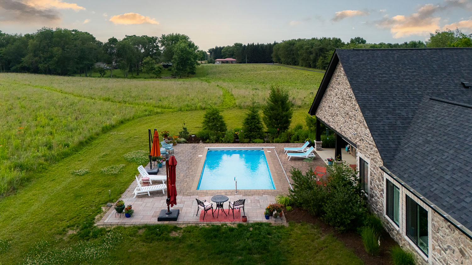 Finish grade and lawn restoration after drainage work by Plant Studio Landscape in East Central Indiana